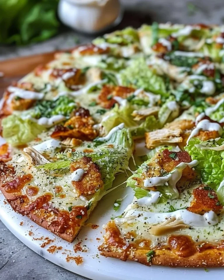 Delicious Chicken Caesar Salad Pizza with crispy crust and fresh toppings