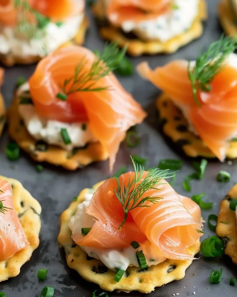 Delicious smoked salmon bites served on a platter with garnishes