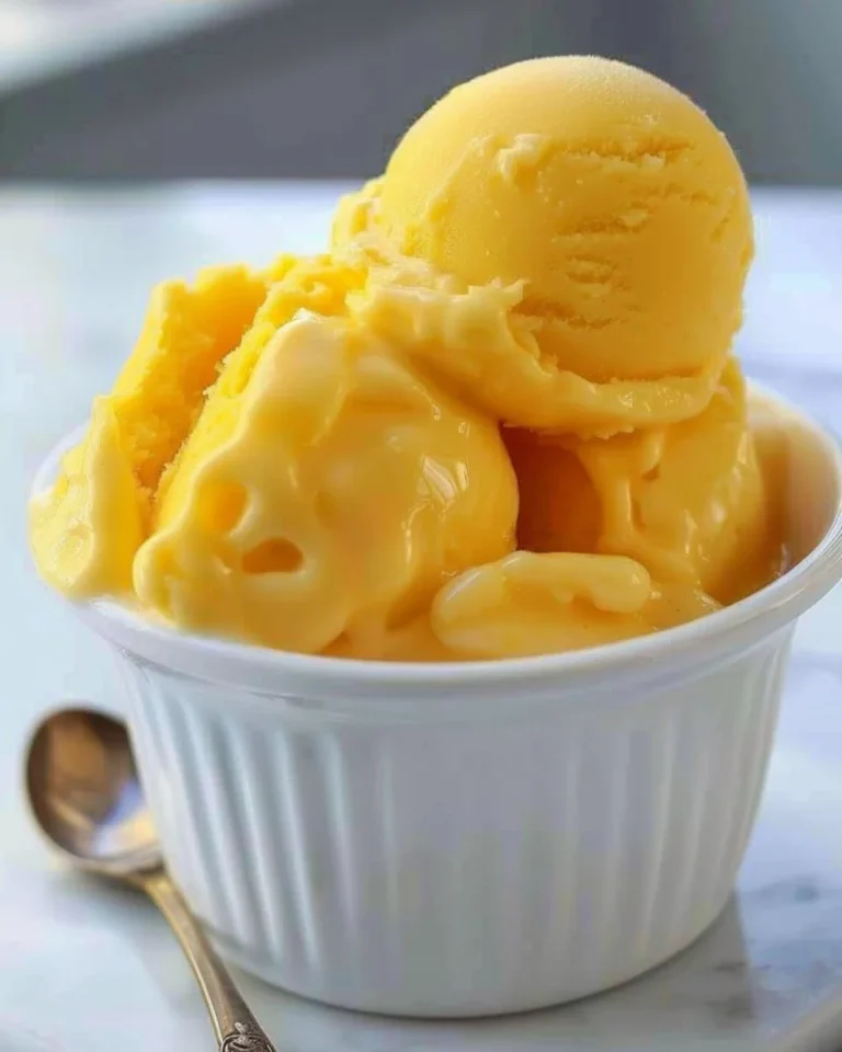Delicious bowl of homemade mango sorbet served in a bright dish