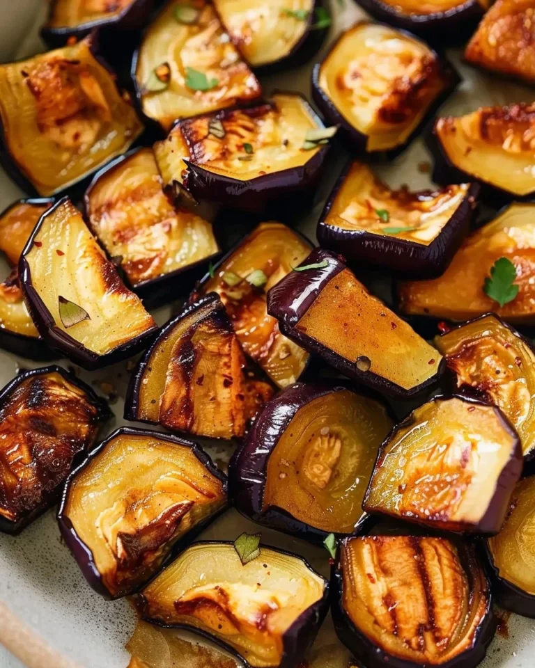 Crispy caramelized roasted eggplant served on a plate